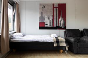 Postel nebo postele na pokoji v ubytování Spacious and cozy 2 bedroom apartment for 7