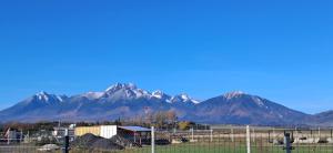 a view of the mountains in the distance at DuoDomkyTa3 in Spišská Belá