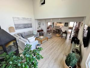 an overhead view of a living room with a couch at SeaSalt Escape in Plettenberg Bay