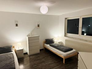 Postel nebo postele na pokoji v ubytování Comfort Stay Apartment in Lauf