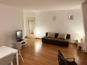 TV a/nebo společenská místnost v ubytování Comfort Stay Apartment in Lauf + 2 fotografie