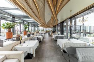 Un restaurant sau alt loc unde se poate mânca la Lazise Pool Villa - Classique