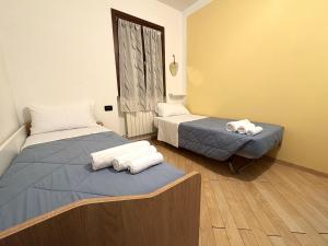 Giường trong phòng chung tại Home Sweet Home