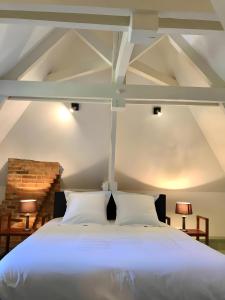 Ένα ή περισσότερα κρεβάτια σε δωμάτιο στο Domaine De La Sablière