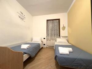 Giường trong phòng chung tại Home Sweet Home +8 ảnh