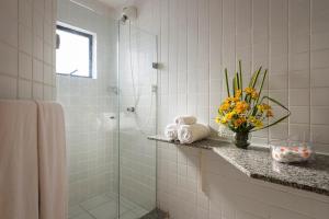 Um banheiro em Hotel Executive Arrey