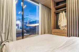 En eller flere senge i et værelse på Brekka Retreat and Spa Iceland