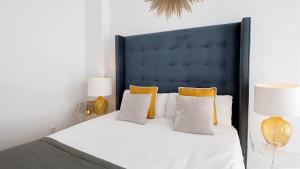 Posteľ alebo postele v izbe v ubytovaní iloftmalaga Studio Apartments
