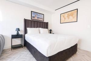 Postel nebo postele na pokoji v ubytování City Centre Oasis