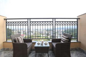 Χώρος καθιστικού στο Lemon Tree Hotel, Mall of Dehradun, Dehradun