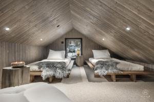 Postel nebo postele na pokoji v ubytování North Suite Nova by Hilla Villas