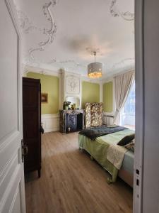 Ένα ή περισσότερα κρεβάτια σε δωμάτιο στο La villa Chatorya