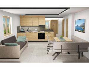 Kuchyň nebo kuchyňský kout v ubytování Apart Montana