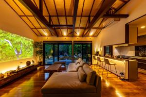 a living room with a couch and a table at 箱根懐來 in Hakone