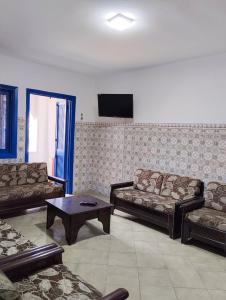 TV a/nebo společenská místnost v ubytování Cozy Harbor Retreat