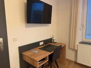 TV a/nebo společenská místnost v ubytování Gästehaus Maimühle - DZ-82