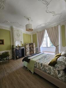 Ένα ή περισσότερα κρεβάτια σε δωμάτιο στο La villa Chatorya