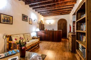 a living room with a couch and a table at Hotel Rural Bentor in Los Realejos