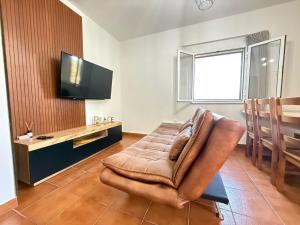 Μια τηλεόραση ή/και κέντρο ψυχαγωγίας στο WildValley Guesthouse