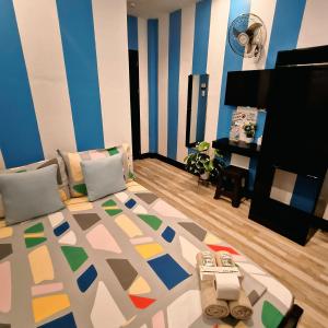 TV a/nebo společenská místnost v ubytování DK's Inn