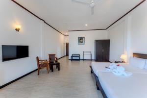 Et tv og/eller underholdning på Rathna Beach Wadduwa