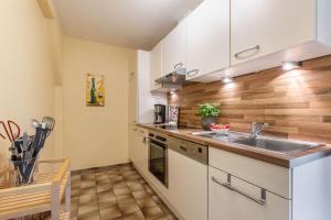 Kuchyň nebo kuchyňský kout v ubytování Ferienwohnung 3
