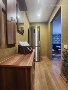 Η κουζίνα ή μικρή κουζίνα στο Žalgirio 1buto apartamentai