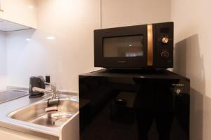 Μια τηλεόραση ή/και κέντρο ψυχαγωγίας στο Tabi and -light- 博多01 +57 φωτογραφίες