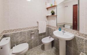 a bathroom with a toilet and a sink at 3 Bedroom Gorgeous Apartment In Malaga in Málaga