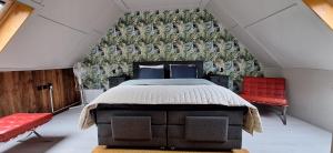 Una cama o camas en una habitación de Vakantiehuisje Meerland43