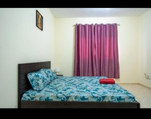 JUH Real Estate and management servise LLC房間的床