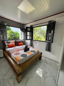 Posezení v ubytování La villa aux 4 palmiers