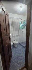 a bathroom with a toilet and a sink at Marially Luxury Bed and Breakfast in Malindi +23 photos