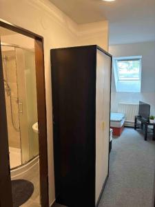 a black and white door in a room at Sport centrum na hřišti in Golčŭv Jeníkov