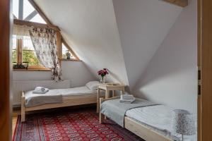 Postel nebo postele na pokoji v ubytování Chata u Flisaków