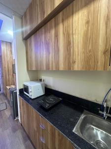 Kuchyň nebo kuchyňský kout v ubytování Cozy bnb