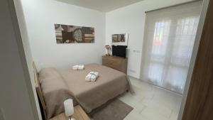 Una cama o camas en una habitación de Vito's House