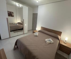 Una cama o camas en una habitación de Vito's House