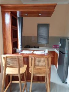 Kuchyň nebo kuchyňský kout v ubytování Bagus ayu Lovina homestay