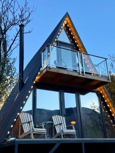 Un balcon sau o terasă la Kuro cottage- A frame