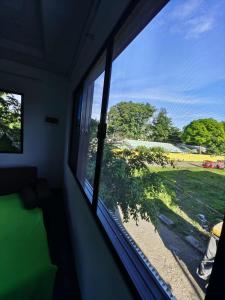 a window in a room with a view of a field at PA L Residence in Euscara