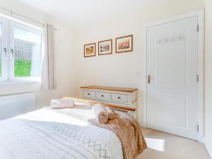 Giường trong phòng chung tại Kincraig Apartment +7 ảnh