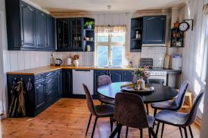 Kuchyň nebo kuchyňský kout v ubytování Leave It All