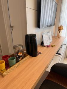 Příslušenství pro přípravu čaje a kávy v ubytování Apartment in the Pantanal - Near UFSC