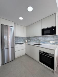 Kuchyň nebo kuchyňský kout v ubytování Pitas del Cabo