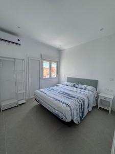 Postel nebo postele na pokoji v ubytování Pitas del Cabo