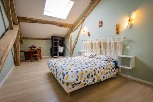 Ένα ή περισσότερα κρεβάτια σε δωμάτιο στο ​Le Gîte du Lac - Piscine Privée +18 φωτογραφίες