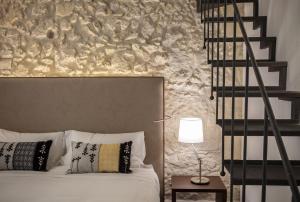 A bed or beds in a room at Arcipelago 41