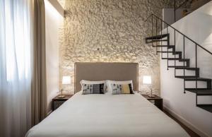A bed or beds in a room at Arcipelago 41