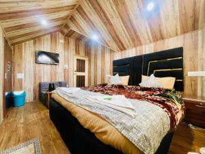 Postel nebo postele na pokoji v ubytování Evergreenheights